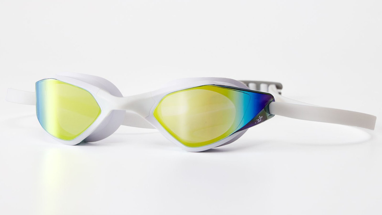 The Eyeline Slash racing swim goggle in white with a gold mirror lens — a finished product from a fully audited swim goggle factory in Suzhou