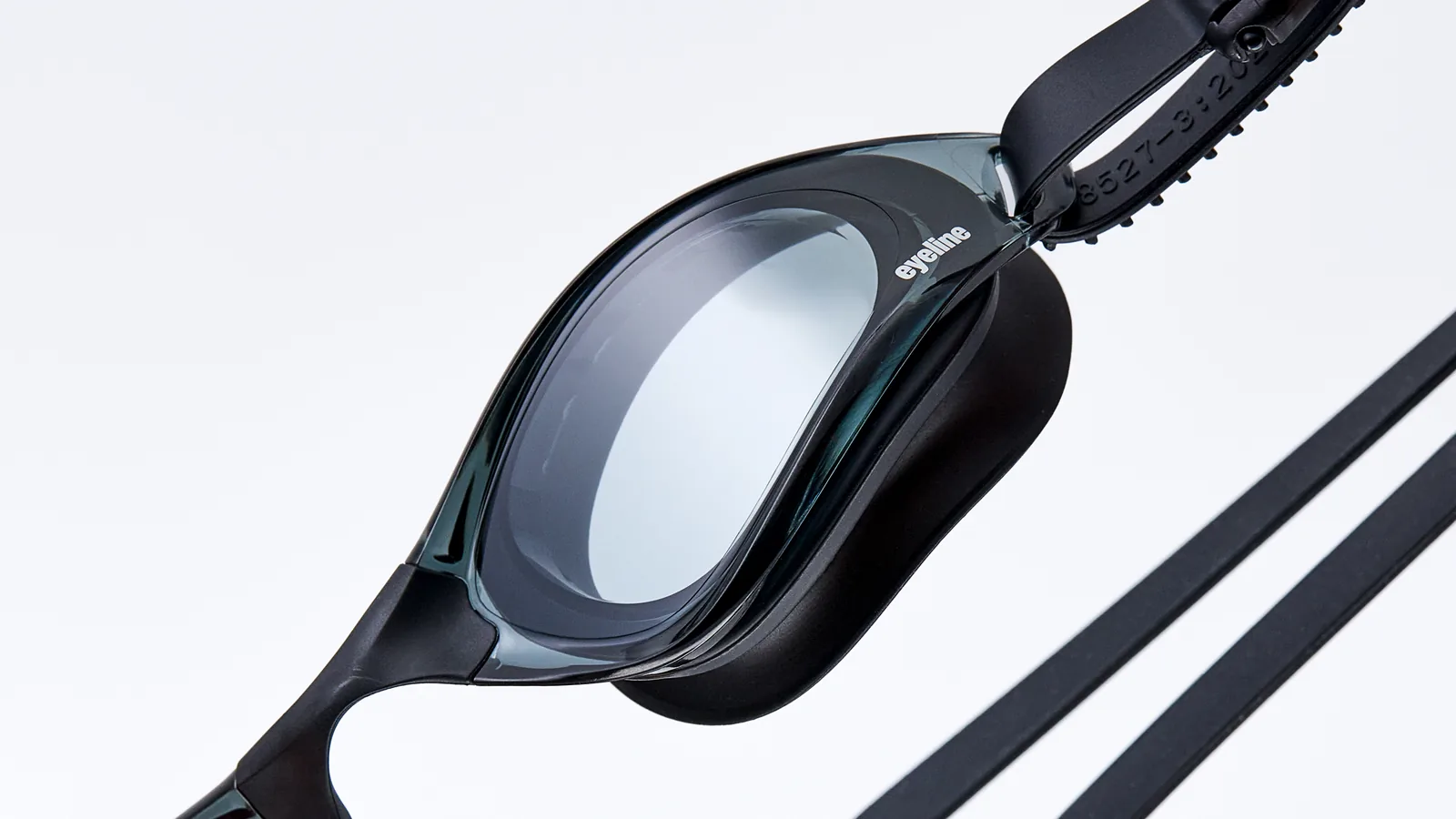 Eyeline Aqua Silicon training swim goggle, high-comfort training design, hero 3/4 lens close-up
