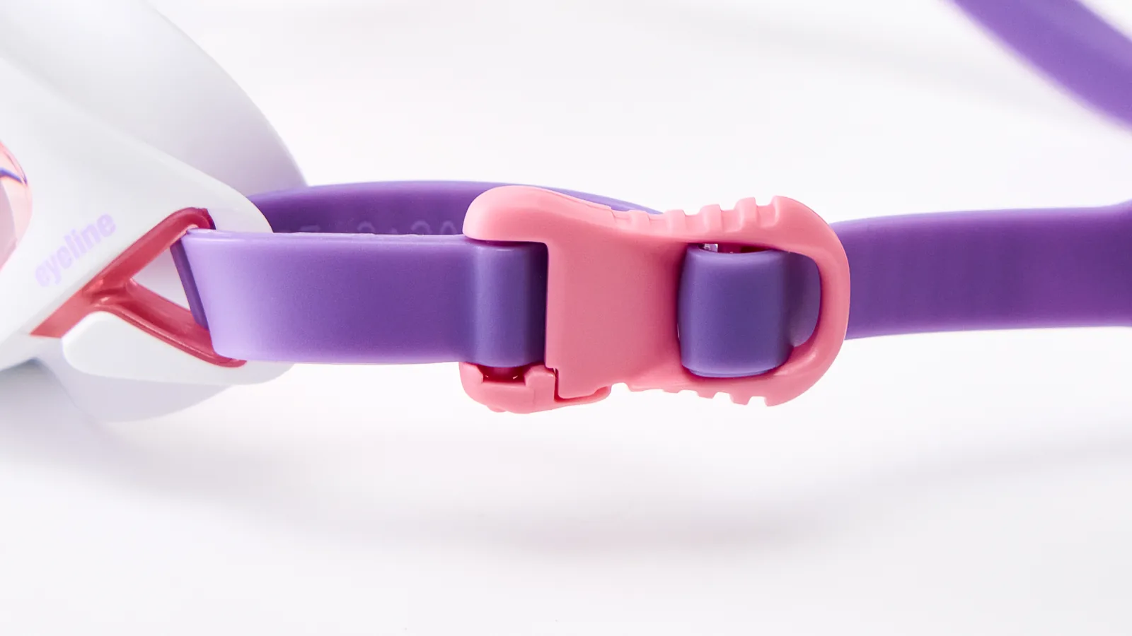Eyeline Storm Junior junior swim goggle, Quick-Adjust Headband System and buckle adjuster detail