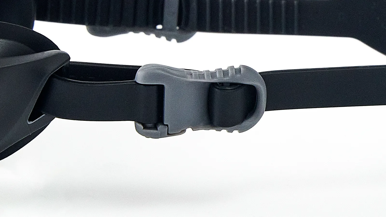 Eyeline Trix training swim goggle, Quick-Adjust Headband System and buckle adjuster detail