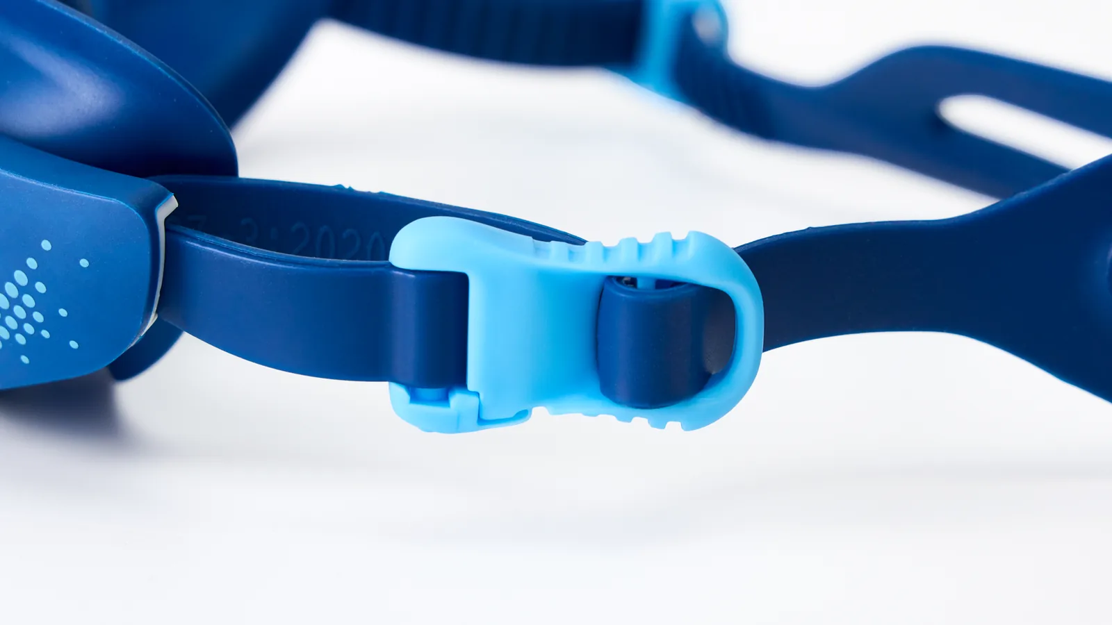 Eyeline Typhoon fitness swim goggle, Quick-Adjust Headband System and buckle adjuster detail
