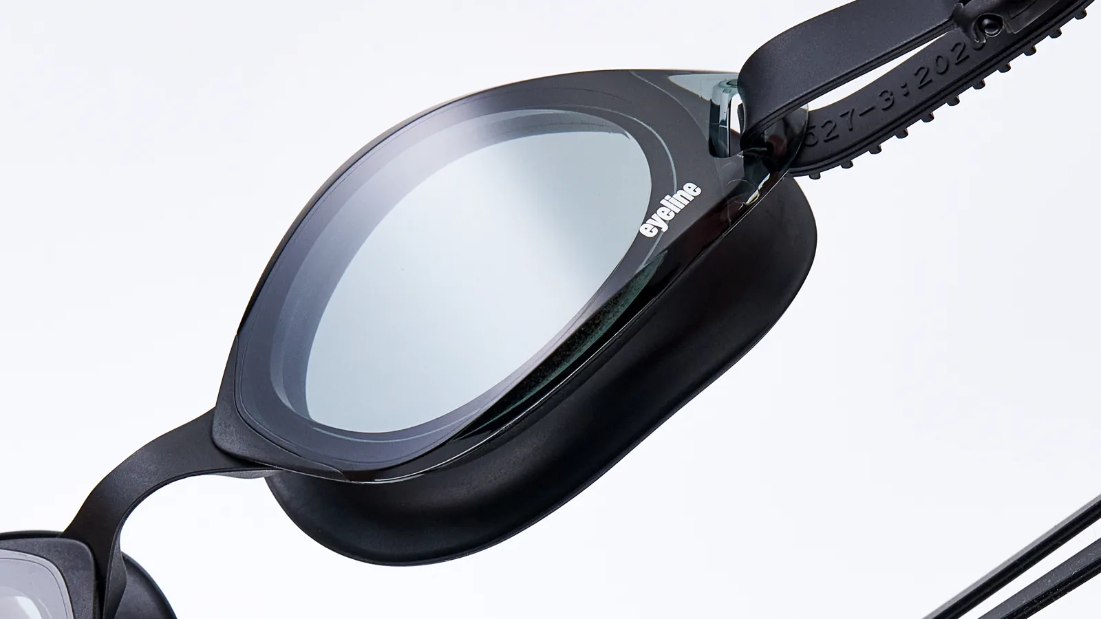Eyeline Zevo fitness swim goggle, low-profile ultra-wide vision design, hero 3/4 lens close-up